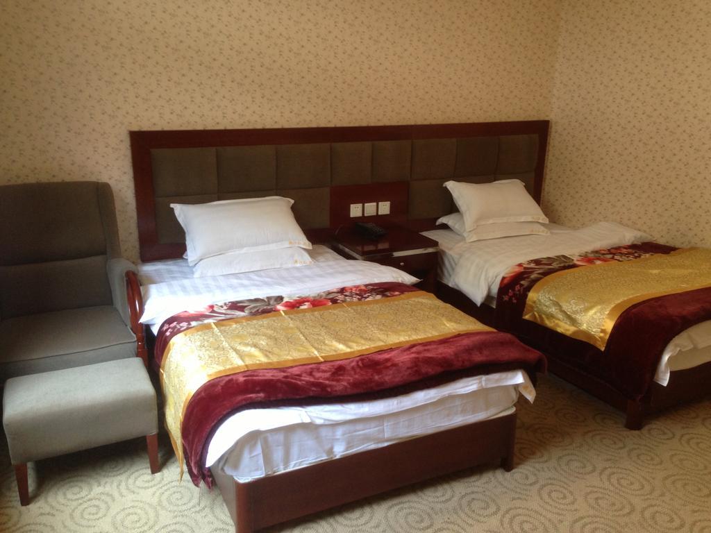 Jiuzhaigou Man Jiang Hong Hotel Rum bild
