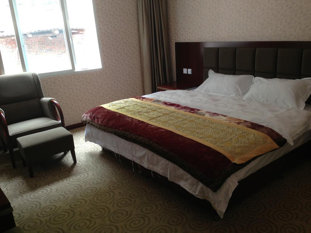 Jiuzhaigou Man Jiang Hong Hotel Rum bild